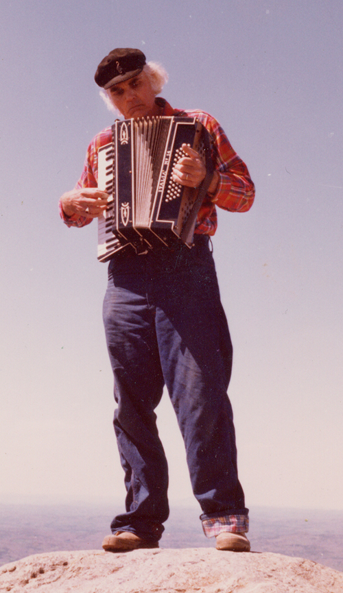 Bob McQuillen plays his accordion on top of Mt. Monadnock, May 15, 1977. Photo © Laurie Indenbaum